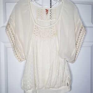 Free People lace crocheted sheer cream blouse size XS.